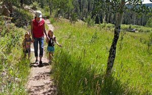 Mom and kids walking path in Golden Gate Canyon State Park