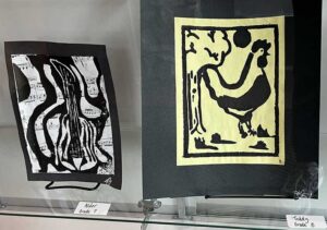 two of middle school art projects on display